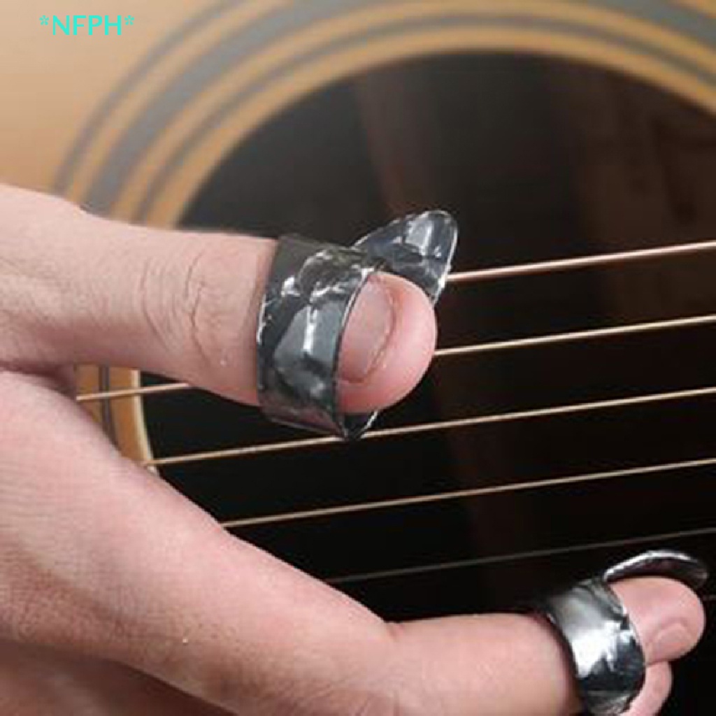 Bộ 4 Miếng Gảy Đàn Guitar Bass Mới