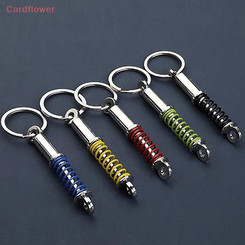 (MớI) Móc KhóA GiảM SốC Cho Xe Hơi