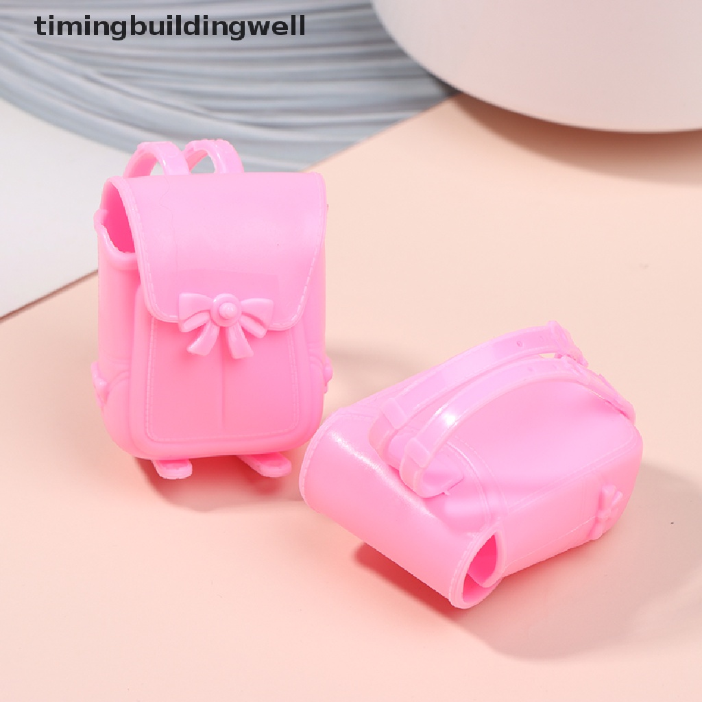 Set 2 Balo Đi Học Mini Bằng Nhựa Đính Nơ Hồng Dễ Thương Cho Búp Bê