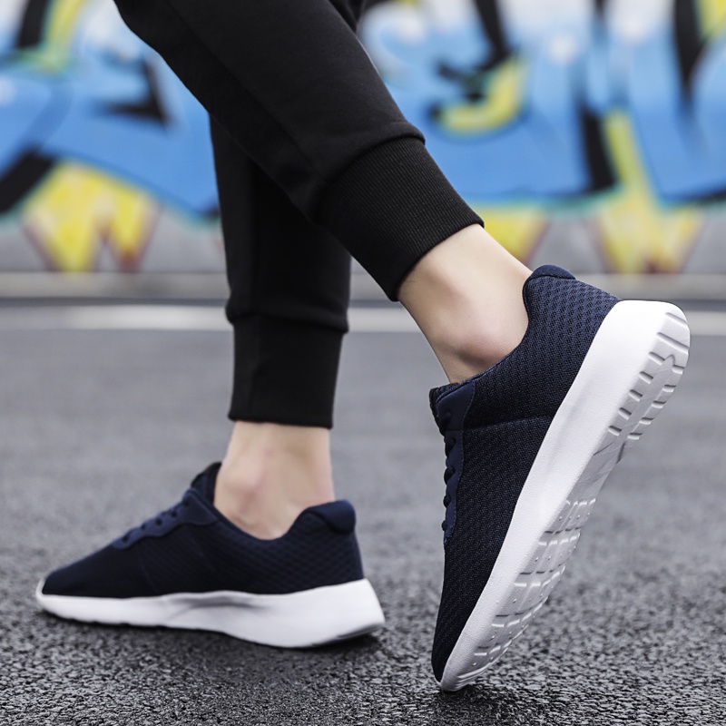 Hàng Có Sẵn Giày Chạy Bộ Thể Thao Rỗng Siêu Nhẹ Thoáng Khí Chống Trượt Phiên Bản Ba Phong Cách London Thời Trang Thường Ngày Dành Cho Nam Và Nữ