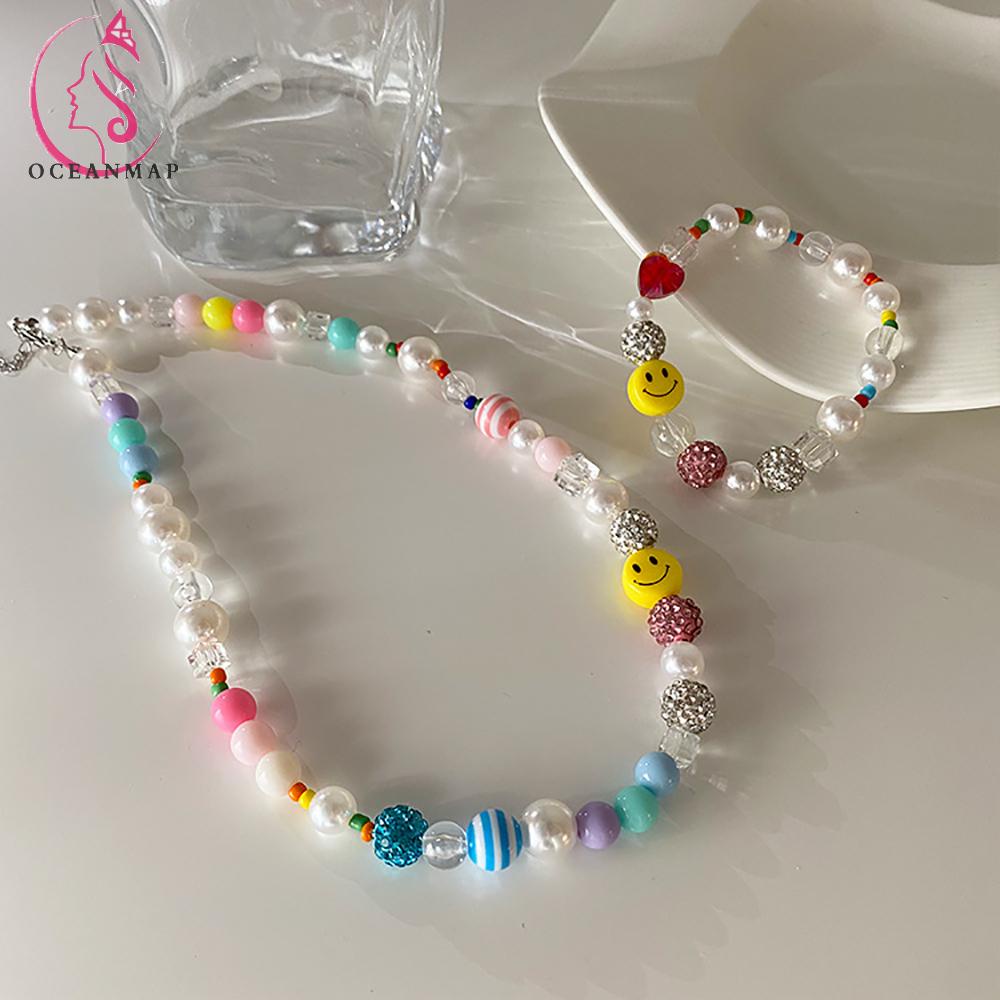 [Hàng mới về] Vòng cổ/ Vòng tay in hình mặt cười đính ngọc trai thiết kế thời trang Hàn Quốc cho nữ