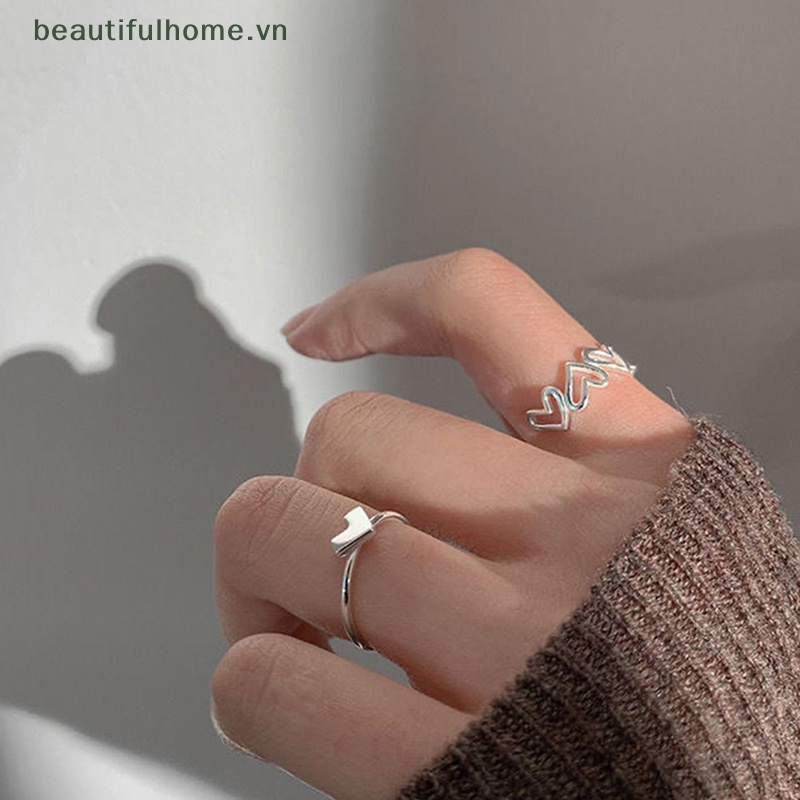 1 Bộ Nhẫn Dạng Hở Màu Bạc Hình Trái Tim Cá Tính Thời Trang Có Thể Điều Chỉnh