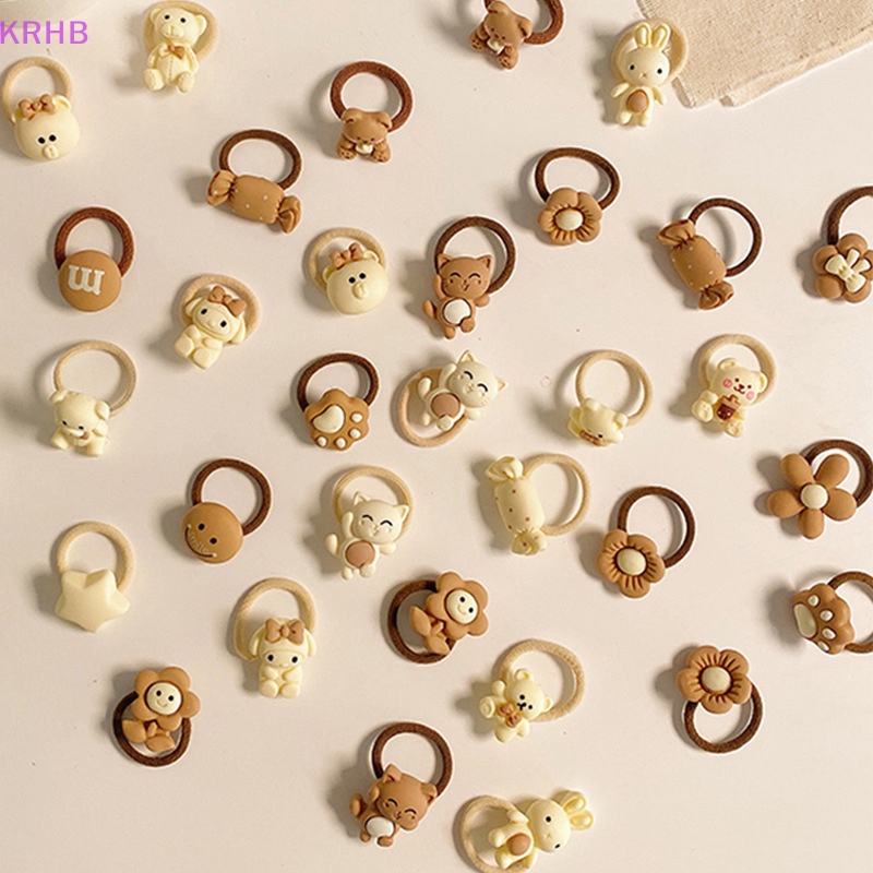 Set 10 Dây Cột Tóc Co Giãn Hình Gấu / Thỏ Mini Dễ Thương Cho Bé Gái Mới