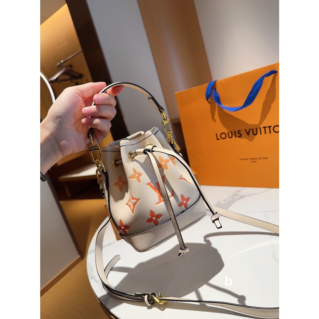 L nano noe túi messenger có dây rút mini dành cho nữ