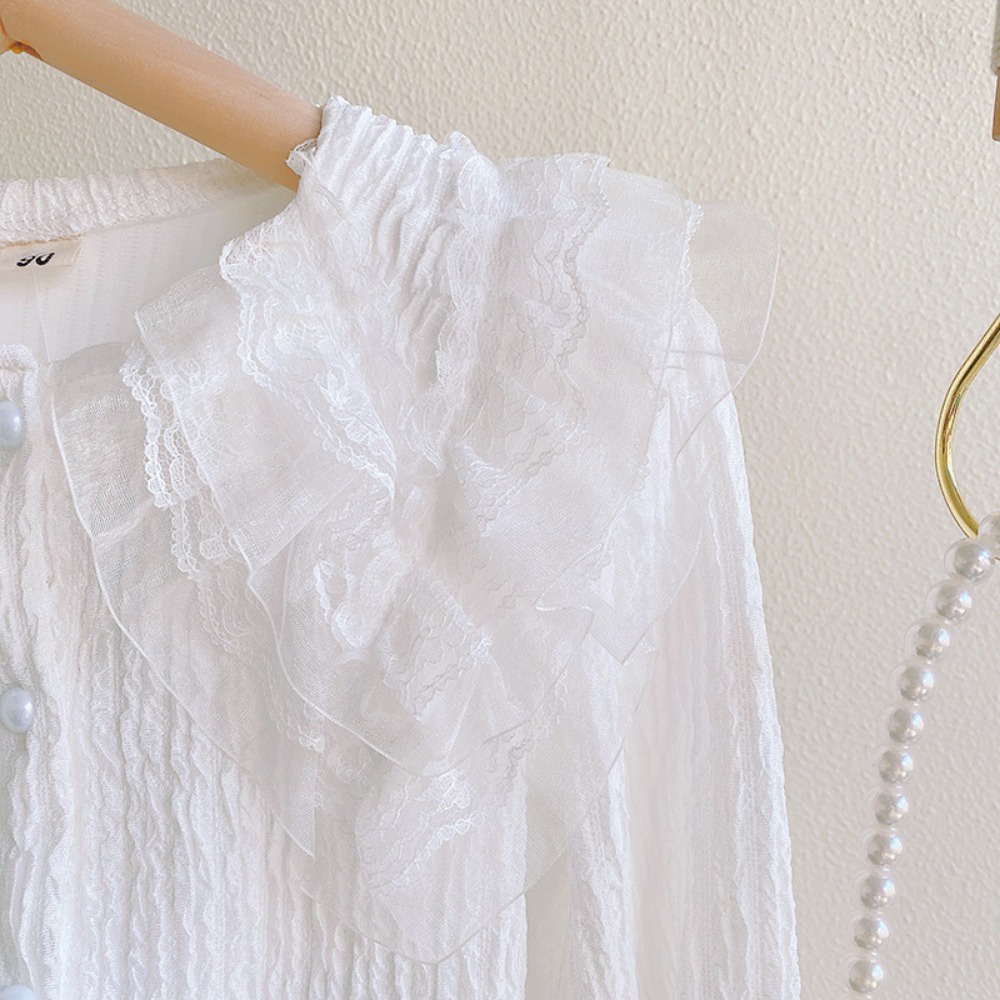 Cô gái mùa thu áo sơ mi ren trẻ em mới ve áo dài tay áo thời trang bé màu rắn áo sơ mi dưới