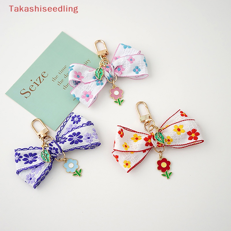 1 Móc Khóa Hình Hoa Hướng Dương Thắt Nơ Xinh Xắn