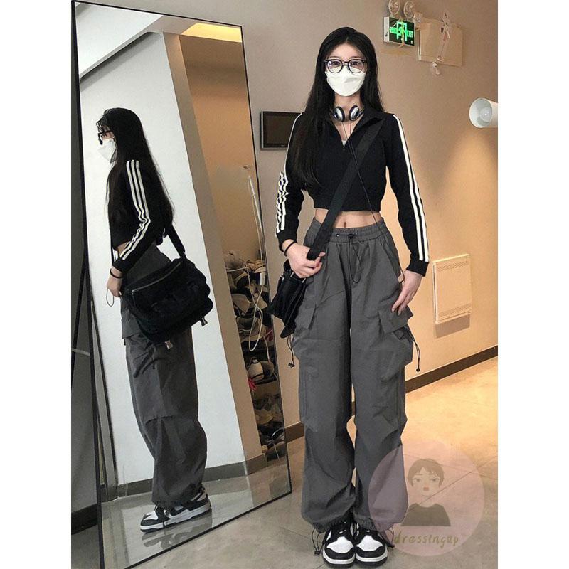 Quần ống rộng Lưng Thun Màu Trơn Phối Túi Cá Tính Cho Nữ