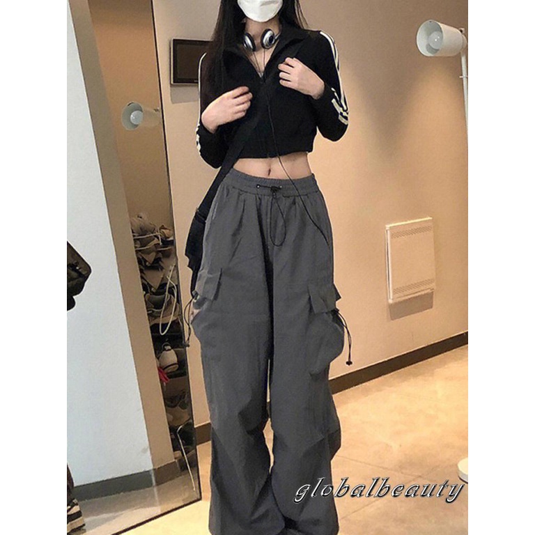 Quần Dài Dáng Rộng Màu Trơn Lưng Thun Phối Túi Thời Trang Đường Phố Cho Nữ