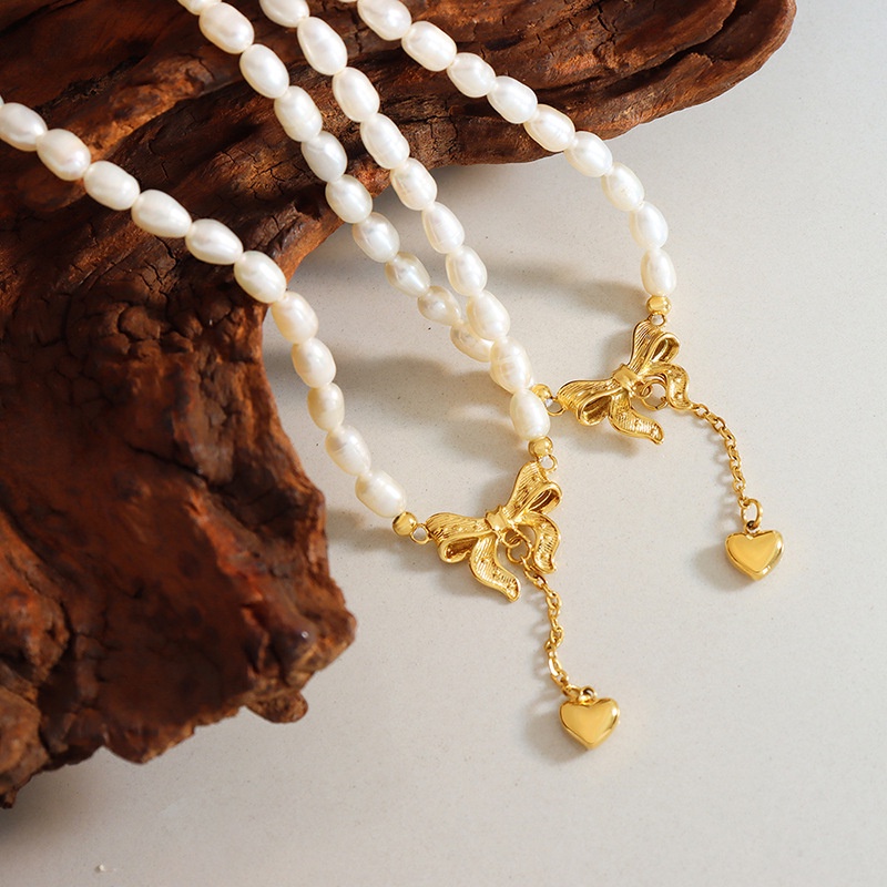 Vòng cổ Ngọc Trai Mặt Nơ Tua Rua Trái Tim Thời Trang Cao Cấp Phong Cách Pháp