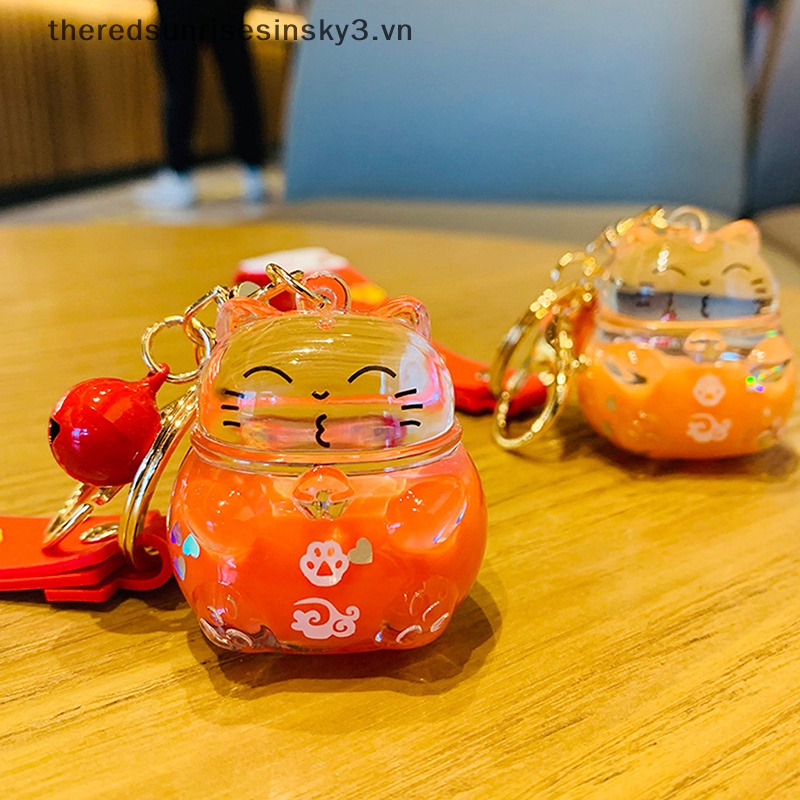 # # Móc Khóa Cao Su Pha Lê Cát Chảy Lỏng Hình Mèo May Mắn Thời Trang.