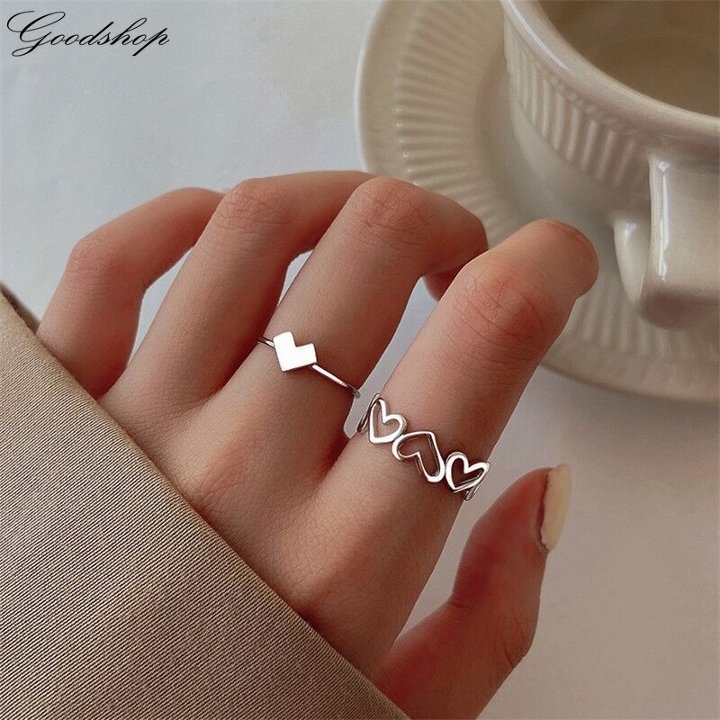 Set 2 Nhẫn Hở Hình Trái Tim Rỗng Màu Bạc Thời Trang Có Thể Điều Chỉnh Cho Nữ