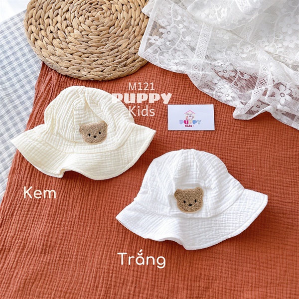 Mũ dành cho em bé  Mũ vải hoa tròn.