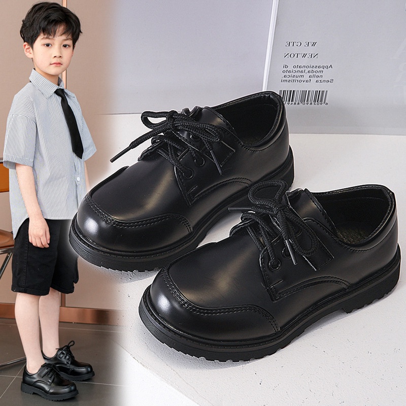 Trẻ em giày trang trọng màu đen cộng với kích thước giày học sinh biểu diễn phong cách anh 3-12 tuổi giày da pu cho bé trai