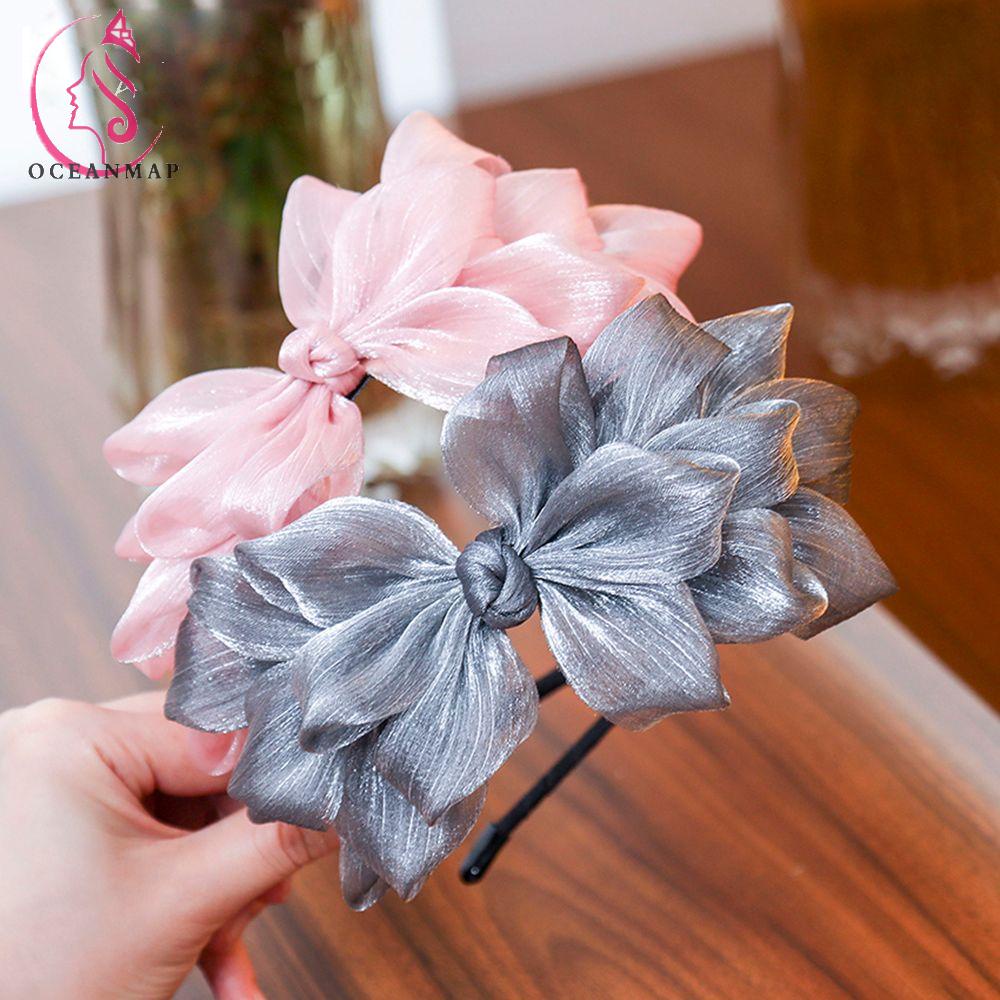 Cài tóc đính nơ bướm lấp lánh xinh xắn