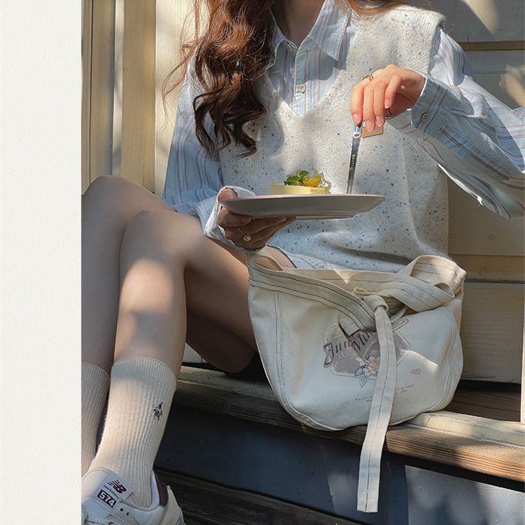 Áo Dệt Kim Sát Nách Dáng Rộng Cổ Chữ V Thời Trang Retro Cho Nữ