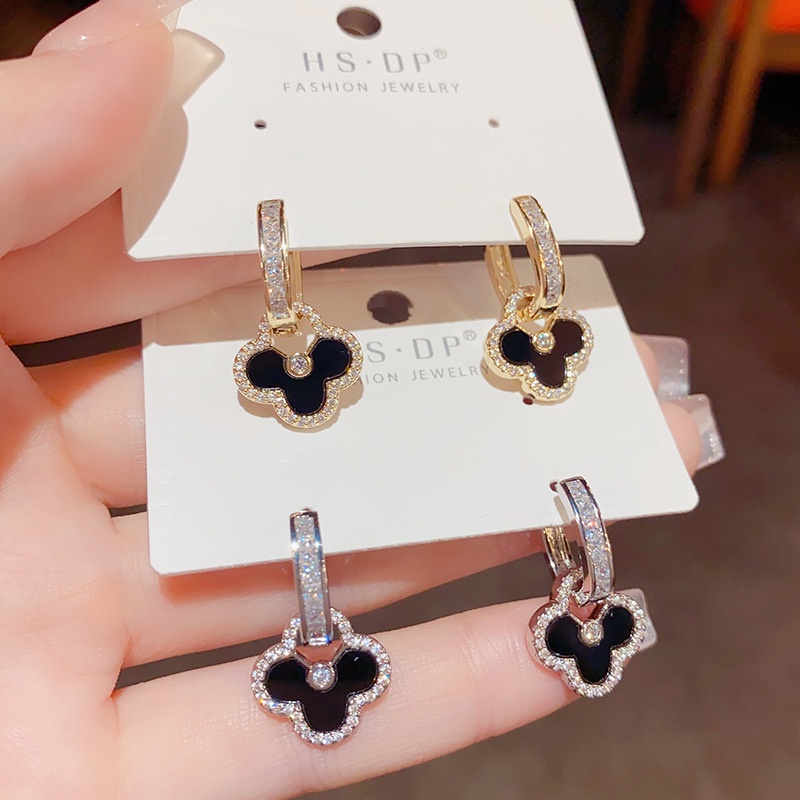 Thời trang hàn quốc phong cách đi lại ánh sáng sang trọng zircon four-leaf flower ear buckle classy high-end earrings bán buôn