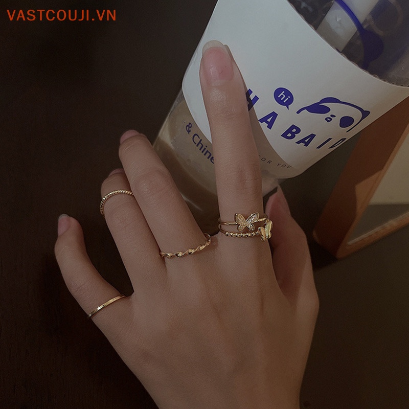 Bộ 4 Nhẫn Hình Tròn Họa Tiết Bướm Màu Bạc Tùy Chỉnh Thời Trang Cho Nữ