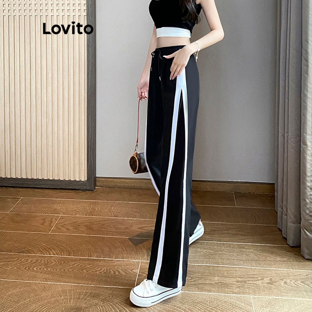 Quần Lovito ống đứng trơn cột phía trước ghép nối màu sắc cho nữ LNE12158 (màu đen)