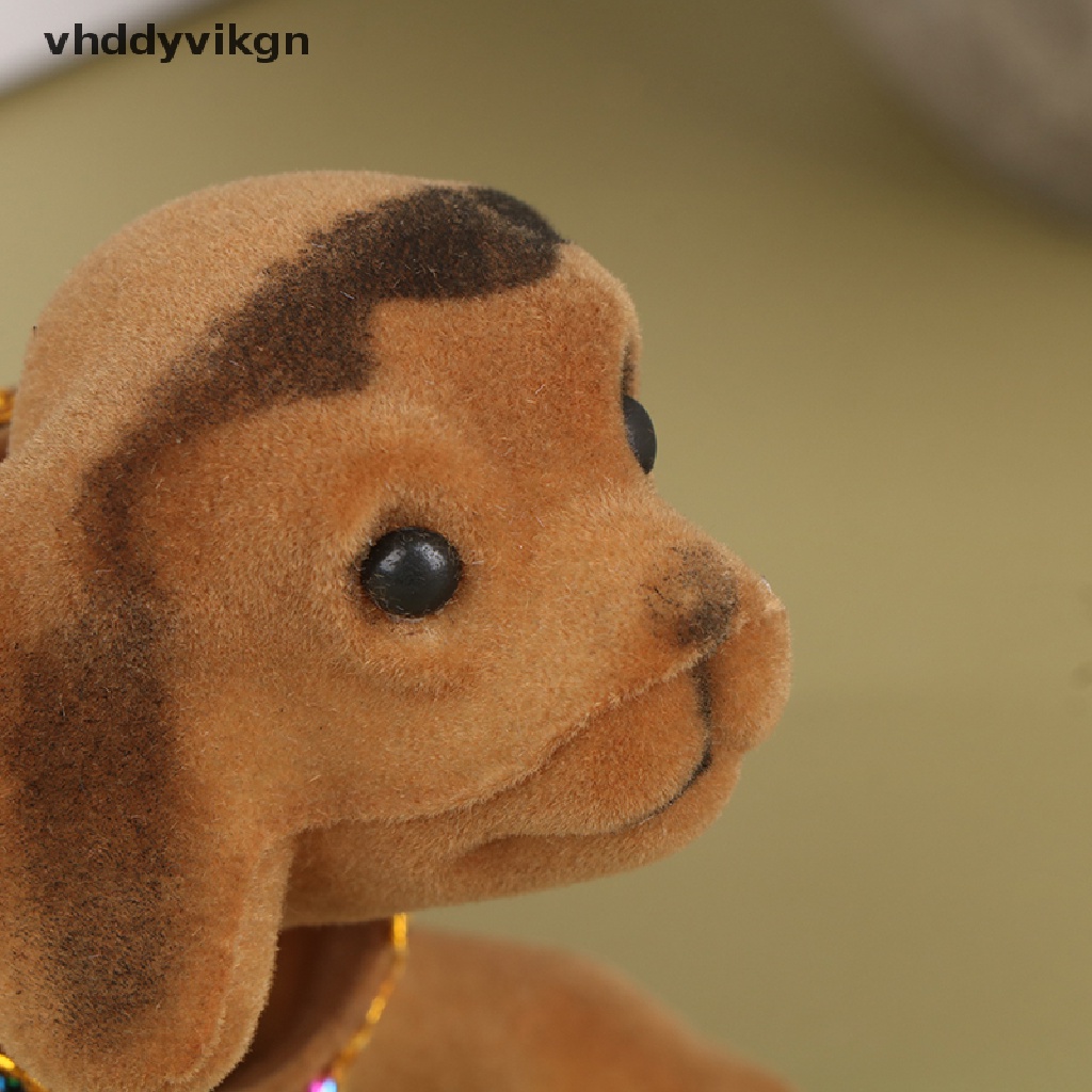 Đồ Chơi Chú Chó Lắc Đầu Trang Trí Bảng Điều Khiển Xe Hơi