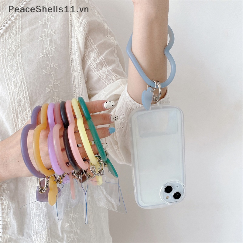 Vòng Đeo Tay Silicon Hình Trái Tim Chống Thấm Nước Chống Thất Lạc Thông Dụng Gắn Điện Thoại