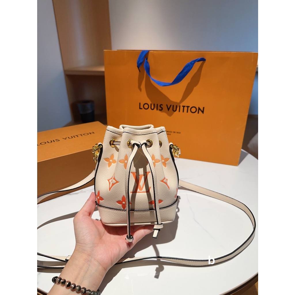 L nano noe túi messenger có dây rút mini dành cho nữ