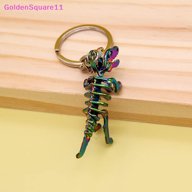 Móc Khóa Hình Xương Khủng Long Bằng Hợp Kim Màu Vàng