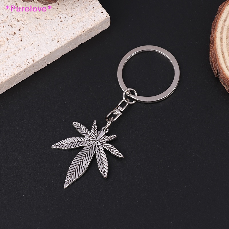 Móc Khóa Kim Loại Hình Lá Phong Màu Bạc Thời Trang Mới