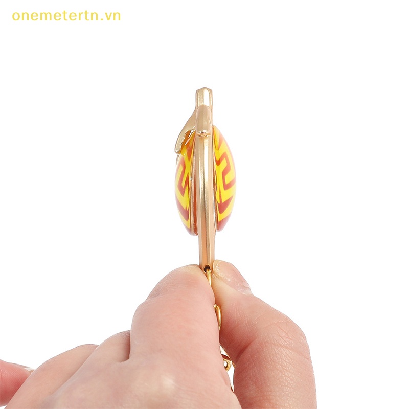 Móc Khóa Hình Đôi Mắt Thần Bằng Thủy Tinh Hai Mặt Phát Sáng onemetertn