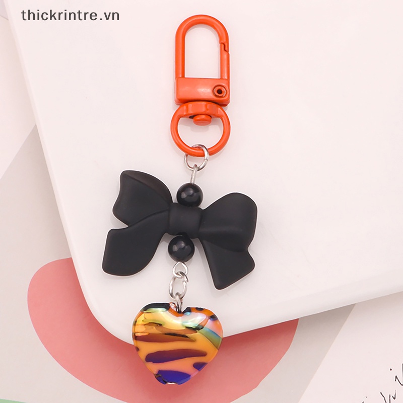 Móc Khóa Hình Trái Tim Thắt Nơ Thanh Lịch Cho Nữ