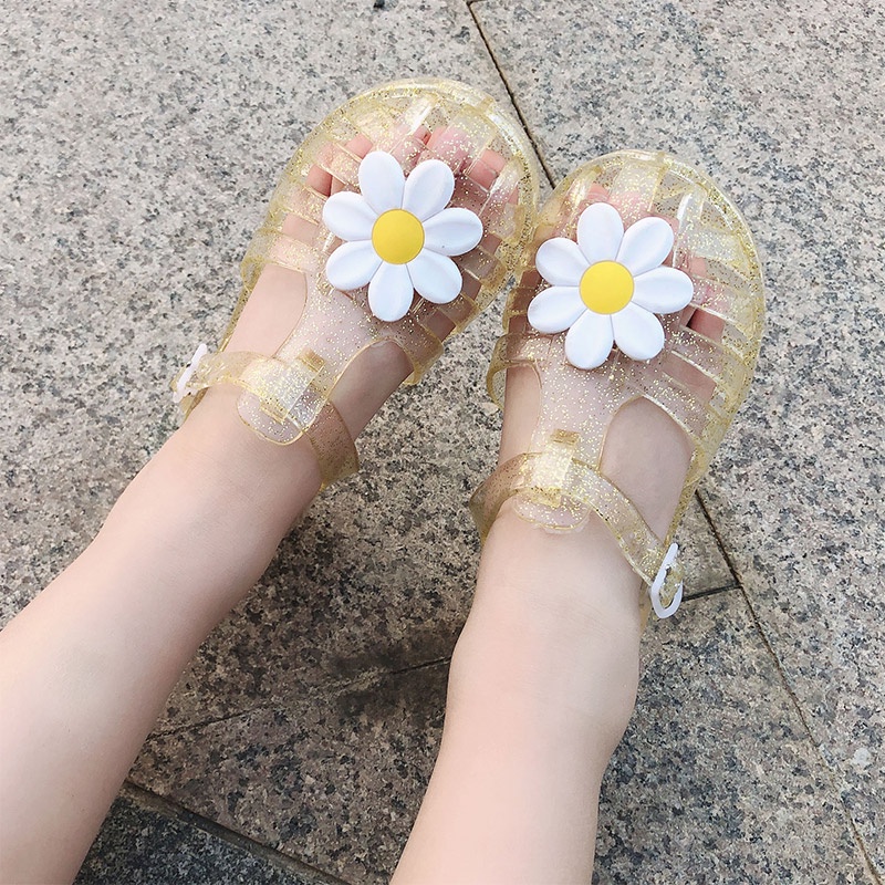 Giày sandal JOYNCLEON bằng nhựa dẻo trong suốt đính hoa dễ thương phong cách La Mã cho bé