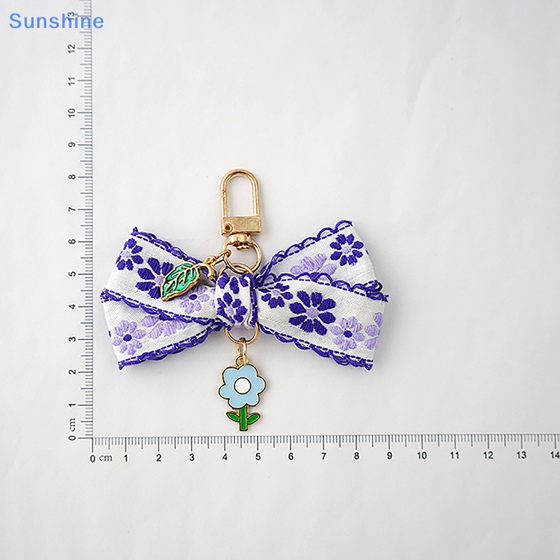 1 Móc Khóa Hình Hoa Hướng Dương Thắt Nơ Ruy Băng Đáng Yêu