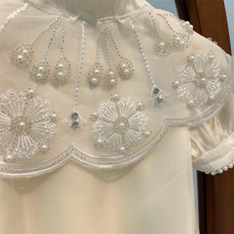 Cô gái retro heavy industry dress 2023 mùa hè phong cách mới trẻ em phong cách phương tây đám mây vai sườn xám bé ngắn tay-váy công chúa