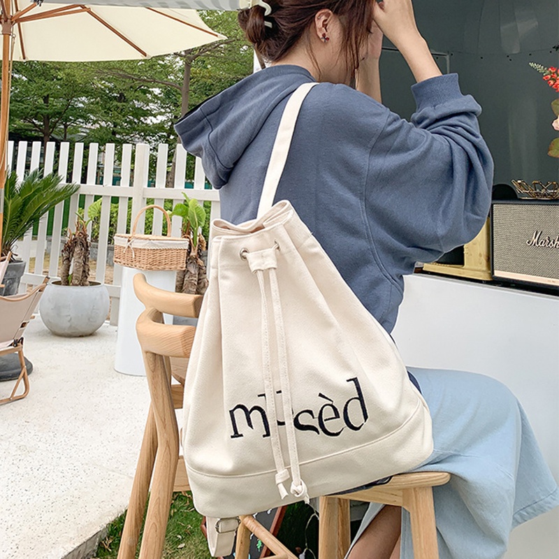 Ba Lô Rút Dây Bằng Vải Bạt Đơn Giản Sức Chứa Lớn In Chữ Thời Trang Phong Cách Hàn Quốc Cho Nữ
