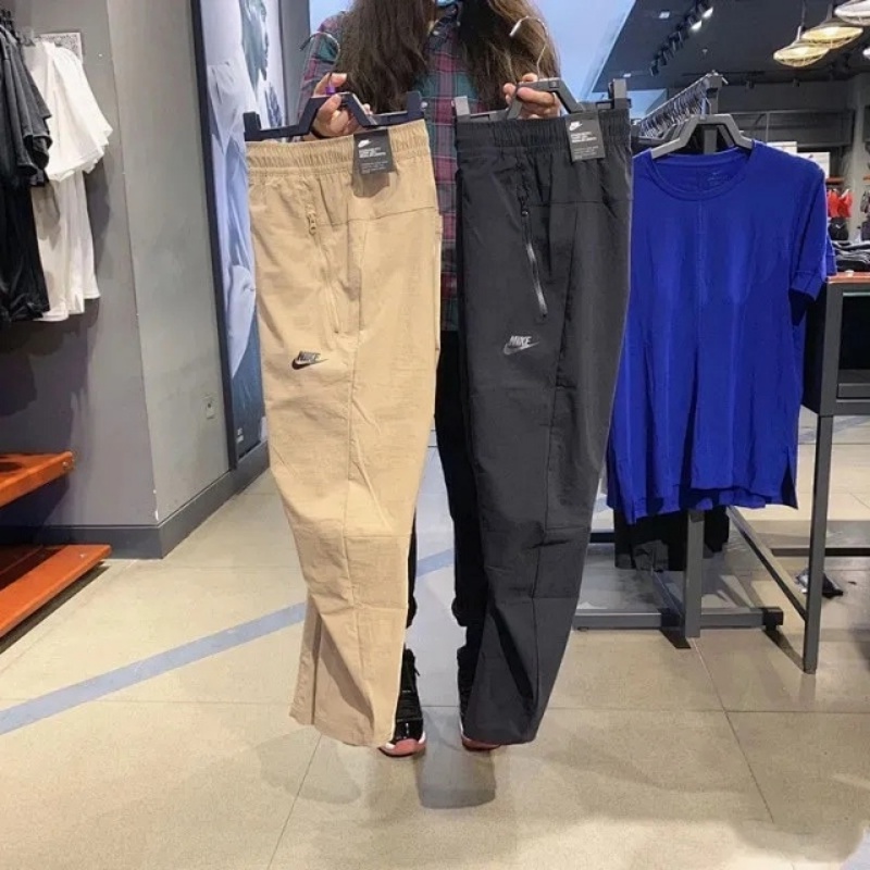 Quần chạy bộ Nike 100% Chính Hãng Dáng Rộng Phối Túi Có Khóa Kéo Thời Trang Dành Cho Nam Giới