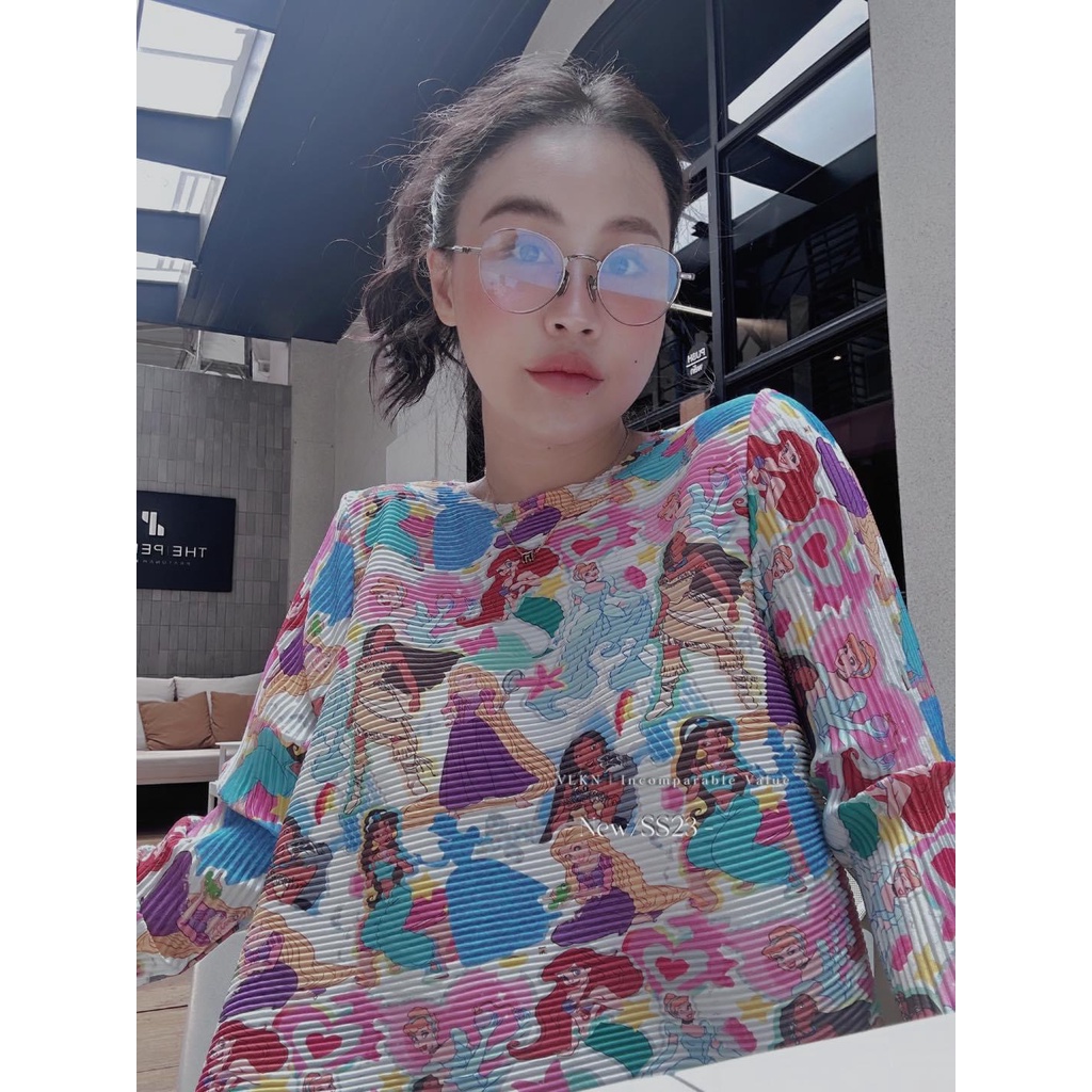 Áo dập ly hoạt hình xéo tà