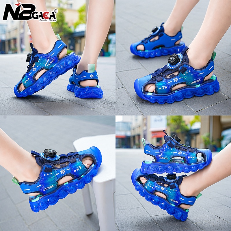Xăng đan Đế Mềm Chống Trượt Có Nút Xoay Thời Trang Mùa Hè Dành Cho Bé Trai Size 28-39