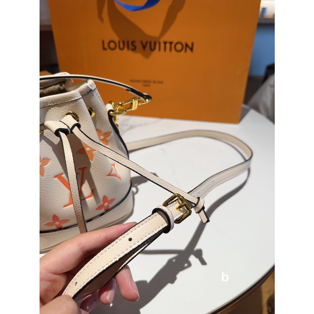 L nano noe túi messenger có dây rút mini dành cho nữ