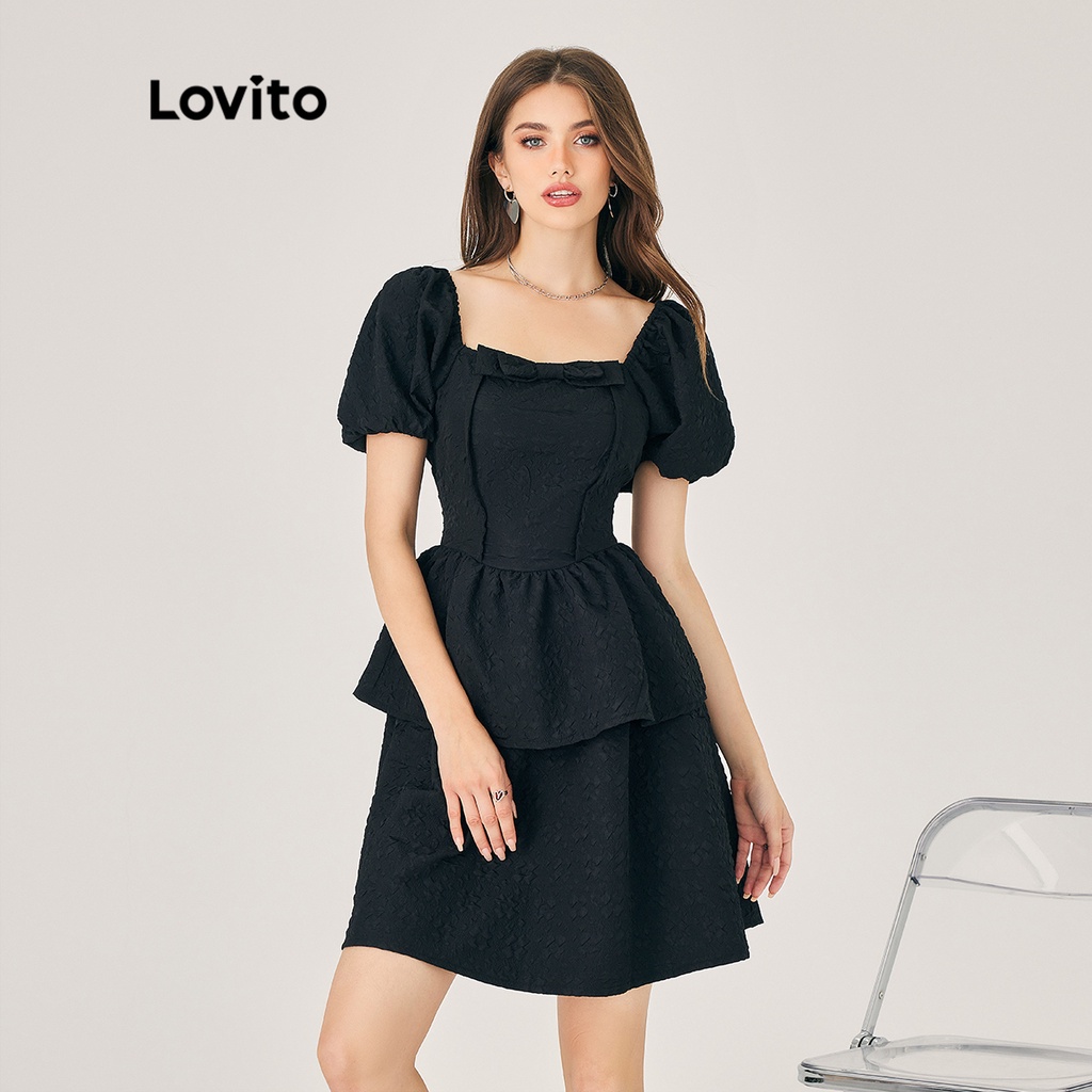 Đầm Lovito tay phồng xếp nếp thắt nơ trước phối bèo màu trơn phong cách cơ bản cho nữ LNE02049 (màu đen)