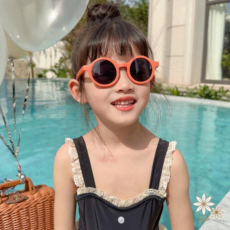 Kính mát gọng tròn chống tia UV màu trơn kiểu dáng dễ thương dành cho bé