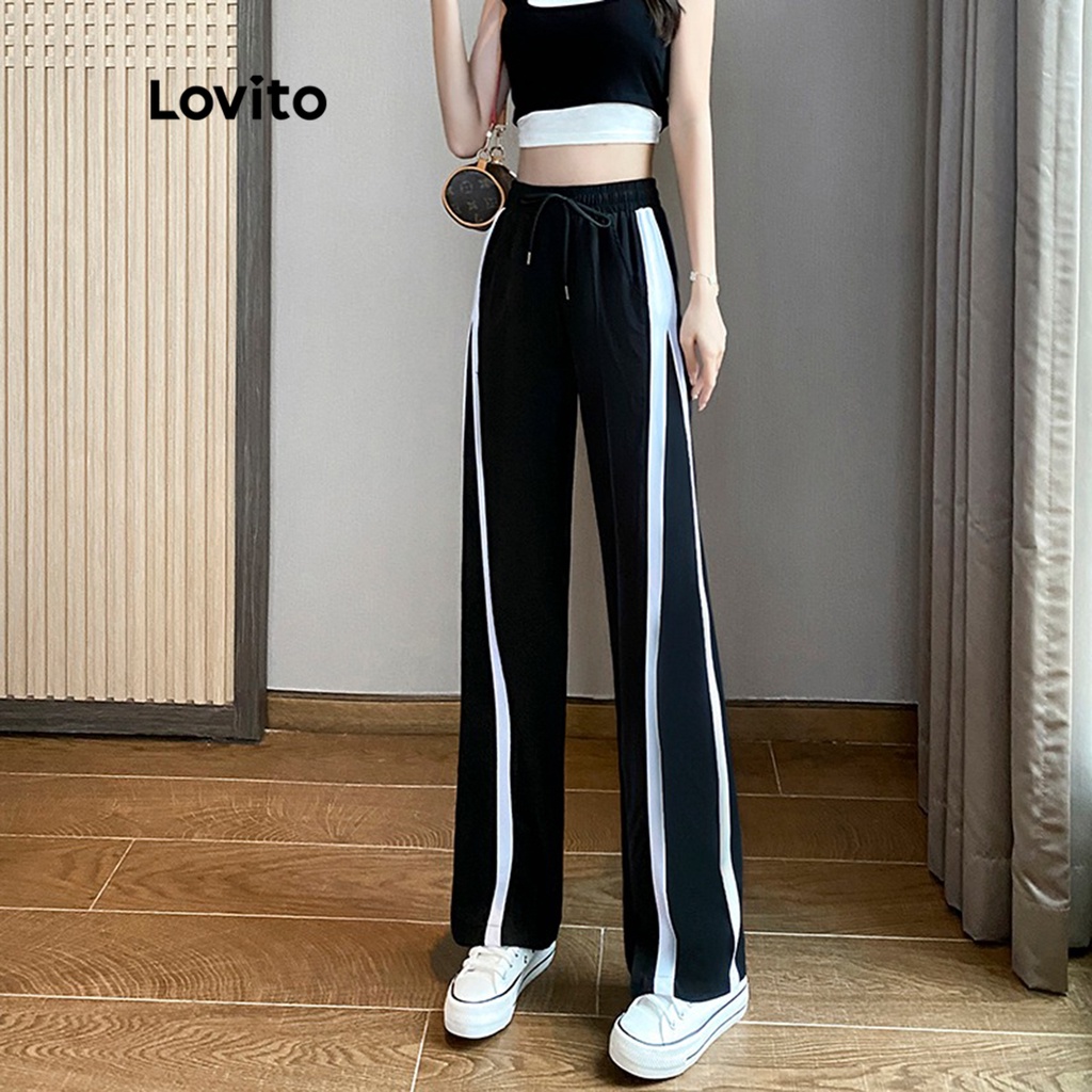 Quần Lovito ống đứng trơn cột phía trước ghép nối màu sắc cho nữ LNE12158 (màu đen)