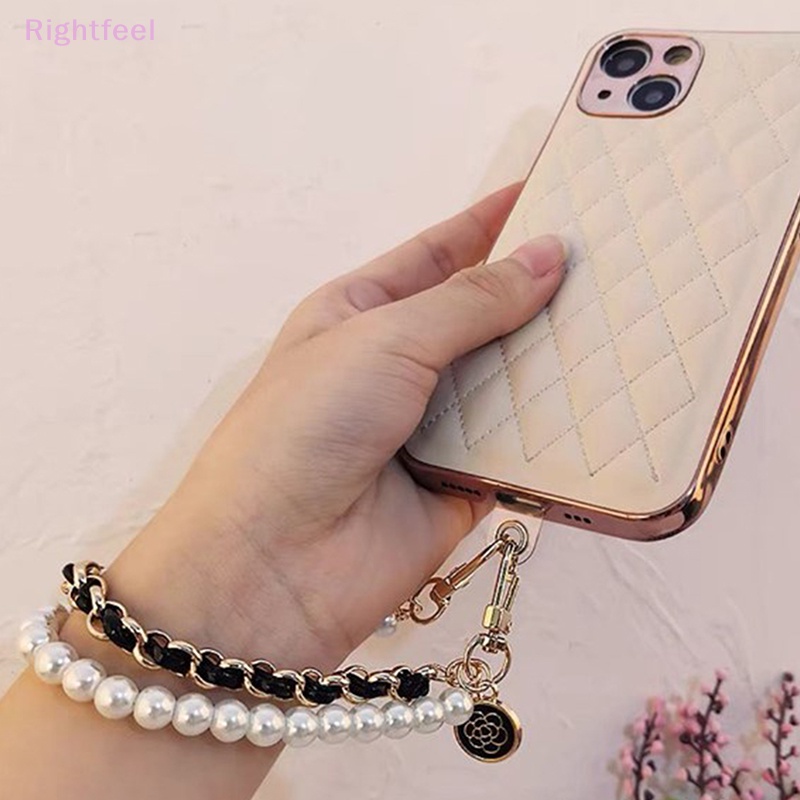 Dây Đeo Tay Bằng Da Đính Ngọc Trai Chống Thất Lạc Cho Điện Thoại Mới