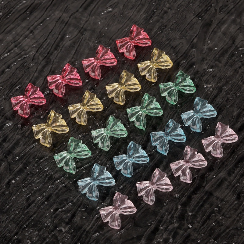 Set 50 Miếng Dán Móng Tay 3D Trong Suốt Hình Nơ Ruy Băng Thắt Nơ Bằng Nhựa Lấp Lánh DIY