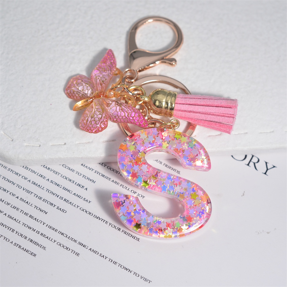 Móc Khóa 26 Chữ Tua Rua Bằng Nhựa Màu Hồng Thời Trang Cho Nữ