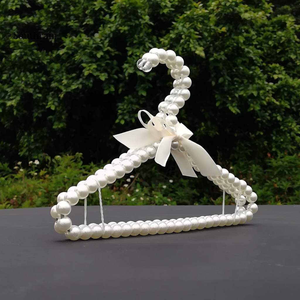 Set 2 Móc Treo Quần Áo Đính Nơ Và Ngọc Trai Nhân Tạo Bằng Nhựa Tiện Lợi