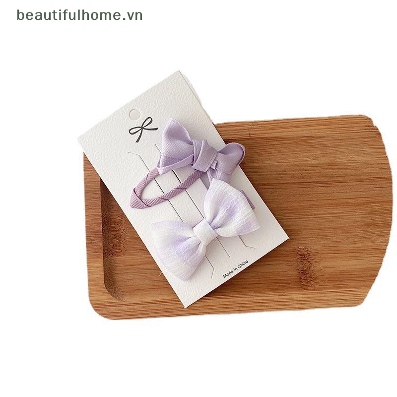 Set 2 Kẹp Tóc Nơ Màu Tím Ngọt Ngào Phong Cách Hàn Quốc Cho Bé Gái