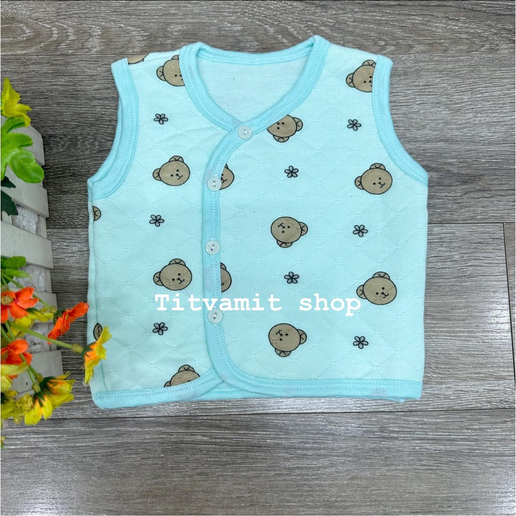 Áo gile vải trần bông cúc chéo họa tiết cho bé mặc thu đông