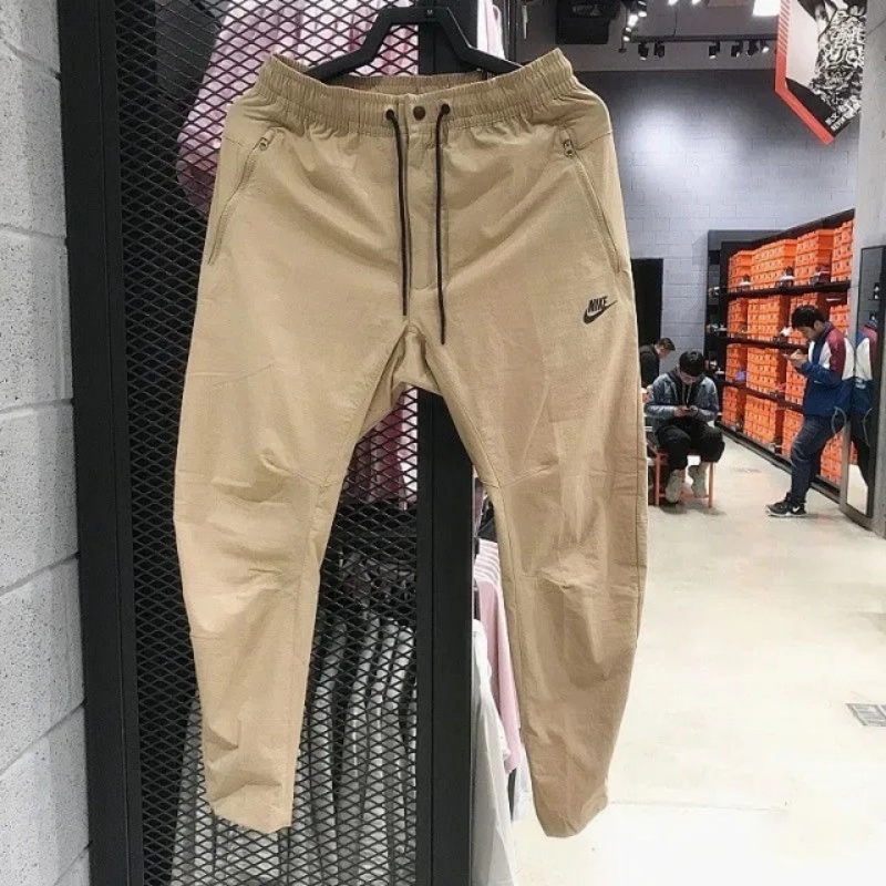 Quần chạy bộ Nike 100% Chính Hãng Dáng Rộng Phối Túi Có Khóa Kéo Thời Trang Dành Cho Nam Giới