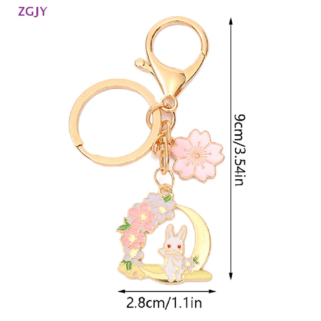 Móc Chìa Khóa Hình Thỏ Và Hoa Màu Hồng Dễ Thương Chống Thất Lạc Thời Trang Cho Bạn Gái Mới