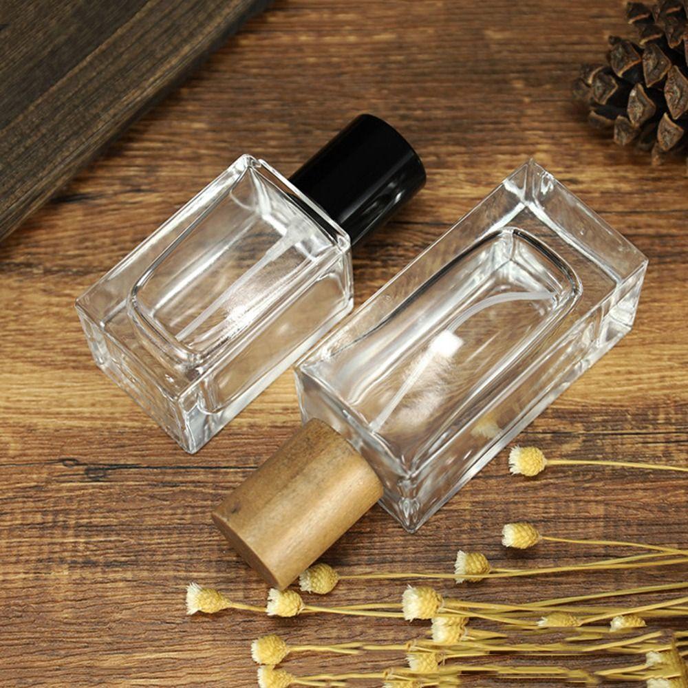 Chai Xịt Thủy Tinh Trong Suốt Có Nắp Gỗ 30 / 50ml Dùng Đựng Mẫu Thử