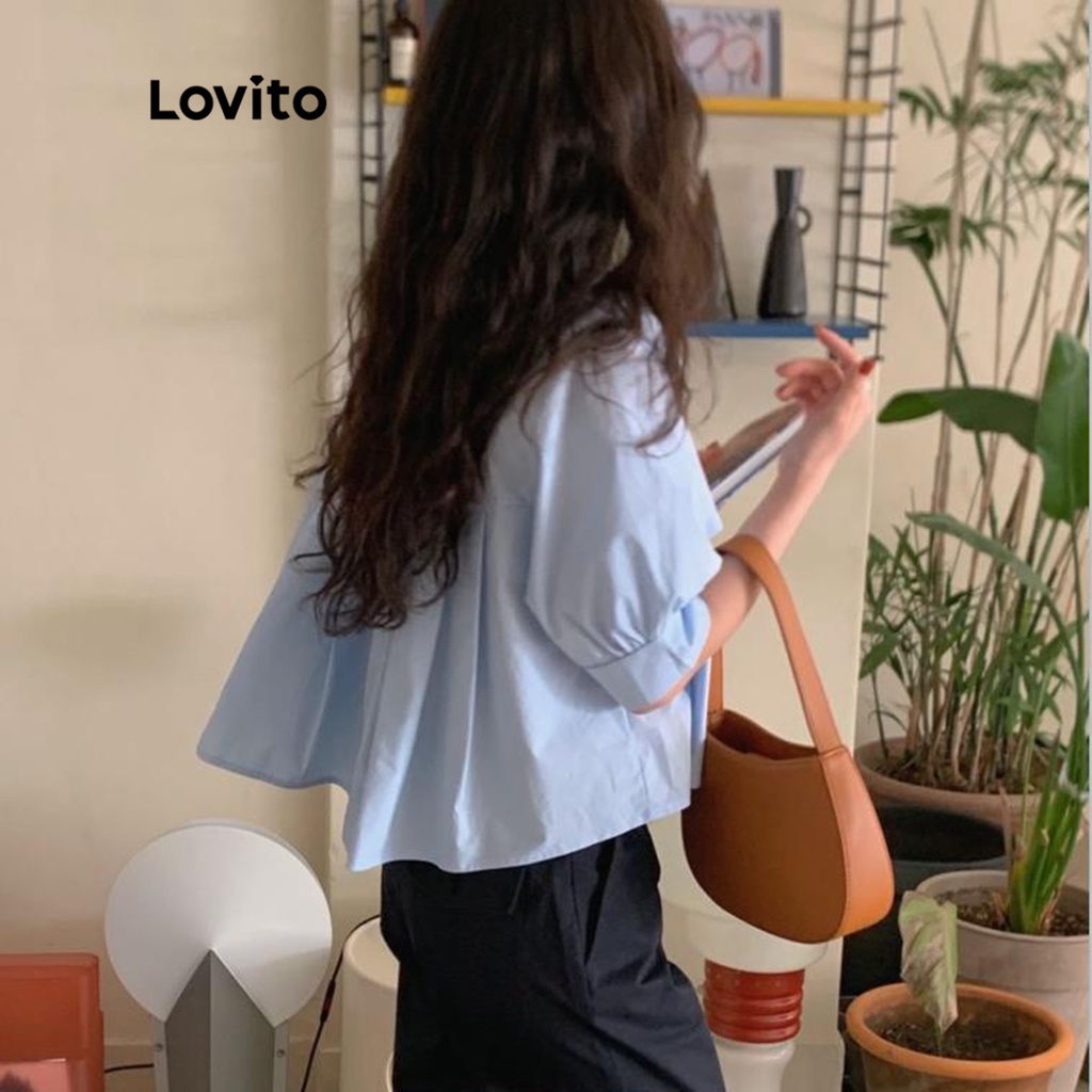 Áo kiểu Lovito tay phồng xếp ly không đối xứng màu trơn thường ngày cho nữ LNA08112 (màu xanh dương)